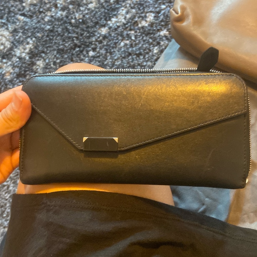 Authentic Cartier Wallet , as is . Bought off The Real Real